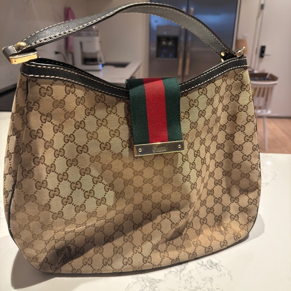 Gucci Handbags - Gucci web hobo monogrammed leather trim bag